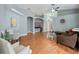 Spacious living room featuring hardwood floors, and a sleek modern interior design at 721 Rollins Dr, Davenport, FL 33837