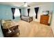 Bedroom with neutral carpet, fan and fixtures, providing a peaceful retreat for rest and relaxation at 760 Eastridge Dr, Orange City, FL 32763