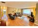 Cozy living room featuring comfortable seating and a bright window at 760 Eastridge Dr, Orange City, FL 32763