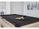 Close-up of the pool table, showcasing the black felt, pool balls, and quality construction at 7770 Sandy Ridge Dr # 207, Reunion, FL 34747