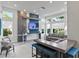 Modern resident lounge with a TV, comfortable seating, and large windows with nice views at 7770 Sandy Ridge Dr # 207, Reunion, FL 34747