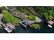 Aerial view of lakeside docks with multiple decks and seating areas at 8125 Via Rosa, Orlando, FL 32836