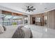 Beautiful main bedroom with floor to ceiling windows and a walk out terrace with lake views at 8125 Via Rosa, Orlando, FL 32836