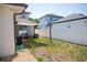 View of a backyard surrounded by a white fence featuring a patio set at 900 S Maple Ave, Sanford, FL 32771