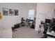 Bright bedroom featuring neutral walls, carpet, and a minimalist design at 900 S Maple Ave, Sanford, FL 32771