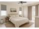 Serene bedroom with neutral tones, a comfortable bed, and a sliding glass door to the outside at 900 S Maple Ave, Sanford, FL 32771