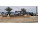 Marina view of boat slips, dry storage and docks with mature trees in the background at 900 S Maple Ave, Sanford, FL 32771