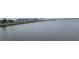 Beautiful wide view of the lake and waterfront area, extending to the horizon under a cloudy sky at 900 S Maple Ave, Sanford, FL 32771