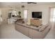 Spacious open-concept design seamlessly connects the living area, dining space, and modern kitchen at 900 S Maple Ave, Sanford, FL 32771