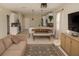Inviting living space with modern decor, a dining area, and open access to the kitchen at 900 S Maple Ave, Sanford, FL 32771
