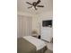 Spacious main bedroom with a dresser, chair, and lots of closet space at 900 S Maple Ave, Sanford, FL 32771