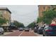 Street view featuring historic brick roads and buildings under a cloudy sky at 900 S Maple Ave, Sanford, FL 32771