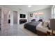 Spacious bedroom with a comfortable bed, natural light, and closet at 1148 Martin L King Dr, Orlando, FL 32805