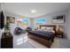 Bright bedroom with a large bed, natural light, and stylish decor at 1148 Martin L King Dr, Orlando, FL 32805