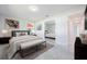 Stylish bedroom with a comfortable bed, mirrored closet, and bright interior at 1148 Martin L King Dr, Orlando, FL 32805