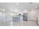 Spacious kitchen with a center island, stainless steel appliances, and plenty of cabinet space at 1148 Martin L King Dr, Orlando, FL 32805