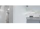 Bright kitchen with modern appliances, white cabinetry, and center island for entertaining at 1148 Martin L King Dr, Orlando, FL 32805