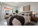 Brightly lit bedroom with comfortable seating area and modern decor at 1148 Martin L King Dr, Orlando, FL 32805