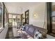 Inviting front porch featuring a swing and comfortable seating for relaxing outdoors at 12 N Forest Ave, Orlando, FL 32803