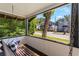 Relaxing porch swing offering a scenic neighborhood view at 12 N Forest Ave, Orlando, FL 32803
