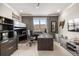 This home office boasts great natural light, built-in shelves, and desk perfect for working at home at 12173 Aztec Rose Ln, Orlando, FL 32827