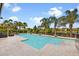 Inviting backyard pool area surrounded by lush landscaping and comfortable patio furniture at 12173 Aztec Rose Ln, Orlando, FL 32827