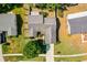 Aerial view of the property showcasing the roof, landscaping, and surrounding neighborhood at 13234 Moonflower Ct, Clermont, FL 34711