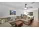 Bedroom suite with a comfortable seating area and a bed at 13234 Moonflower Ct, Clermont, FL 34711