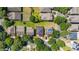 An aerial view shows the property's location within a community with mature trees and landscaping at 13247 Hatherton Cir, Orlando, FL 32832