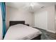 Bedroom with a double bed, closet, blue rug and a ceiling fan at 13247 Hatherton Cir, Orlando, FL 32832