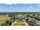Beautiful aerial view showcases the golf course community, clubhouse, and surrounding landscape at 13247 Hatherton Cir, Orlando, FL 32832