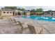Inviting pool area featuring lounge chairs, a clear blue pool, and well-maintained surroundings at 13247 Hatherton Cir, Orlando, FL 32832