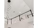 Modern staircase design featuring dark railing and bright, open space at 13247 Hatherton Cir, Orlando, FL 32832