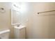 Bathroom featuring a bright vanity, mirror, modern lighting, and a new faucet at 1411 N Powers Dr, Orlando, FL 32818