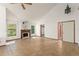 Living room featuring tile floors, fireplace, and a vaulted ceiling at 1450 Harbour Dr, Longwood, FL 32750