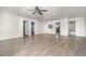 Open living room features clean lines, neutral walls and light wood flooring at 1506 37Th St, Orlando, FL 32839