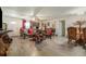 Spacious living room with new flooring, with updated lighting and ornate furnishings at 1506 37Th St, Orlando, FL 32839