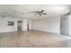 Bright, airy living room featuring wood floors and a pass through to the kitchen at 1506 37Th St, Orlando, FL 32839