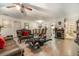 Open-concept living area with new flooring, a fireplace, and elegant dining set at 1506 37Th St, Orlando, FL 32839
