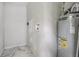 Utility room features a water heater and tiled floor at 1506 37Th St, Orlando, FL 32839