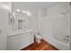 Clean bathroom with vanity sink, mirror, and a shower-tub combination at 1630 Common Way Rd # 303, Orlando, FL 32814