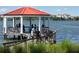 Waterfront gazebo is a peaceful community gathering place for picnics, socializing, and lakeside enjoyment at 1630 Common Way Rd # 303, Orlando, FL 32814