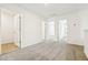 Spacious room with neutral carpet and access to different rooms at 16447 Bird Of Paradise Ave, Clermont, FL 34714