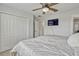 Bright bedroom with ceiling fan, television and large closet at 17106 Guilford Ct, Orlando, FL 32820