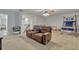 Spacious bonus room with comfortable seating and a ceiling fan at 17106 Guilford Ct, Orlando, FL 32820