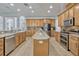 Spacious kitchen with stainless steel appliances, granite countertops, tile backsplash and ample cabinet space at 17106 Guilford Ct, Orlando, FL 32820