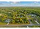 Beautiful aerial view of a wooded lot perfect for building a custom dream home at 18026 Reynolds Pkwy, Orlando, FL 32833