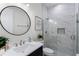 Modern bathroom with dark vanity, a walk-in shower, and elegant decor at 18026 Reynolds Pkwy, Orlando, FL 32833
