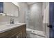 Bathroom featuring a glass walk-in shower and a modern vanity with clean lines at 18026 Reynolds Pkwy, Orlando, FL 32833