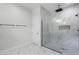 Modern bathroom with glass shower, luxurious tile, and a towel bar on the left at 18026 Reynolds Pkwy, Orlando, FL 32833